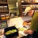 The Lunch Room prep cook Bill Garvey prepares brussels sprouts in the new location at the Kerrytown Market & Shops, at 407 N 5th Ave., on Tuesday, August 6, 2013.Melanie Maxwell | AnnArbor.com